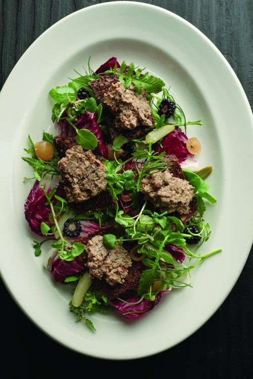 Image for article: Duck liver toast with bitter leaves and blackberries
