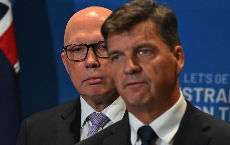 Opposition Leader Peter Dutton flanks the shadow treasurer, Angus Taylor.