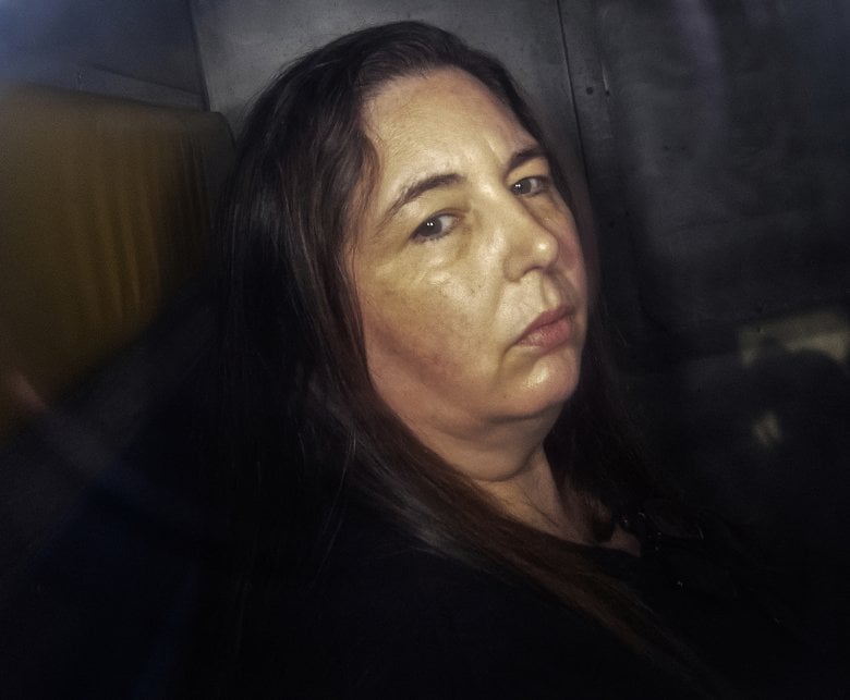 Erin Patterson arriving in the back of a prison transport vehicle at the Latrobe Valley Magistrates’ Court in Morwell during her trial for murder.