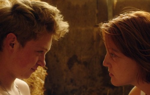 Clément Faveau and Maïwene Barthelem in Holy Cow.